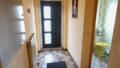 Windfang mit Garderobe