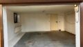 Haushälfte 2 sehr grosse Garage mit Durchgang ins Haus