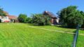 Zusätzliche Rasenfläche / Grundstück hinter dem Haus