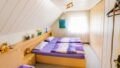 Erstes Schlafzimmer im DG