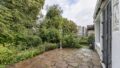 Außenbereich mit Terrasse und Garten