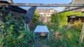 Terrasse und Gartenhütte